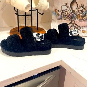 Ugg women’s fluff black platform slippers size 10. No returns.!